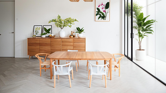 The Mar Vista Scandinavian oval dining table top detail showing solid walnut wood grain