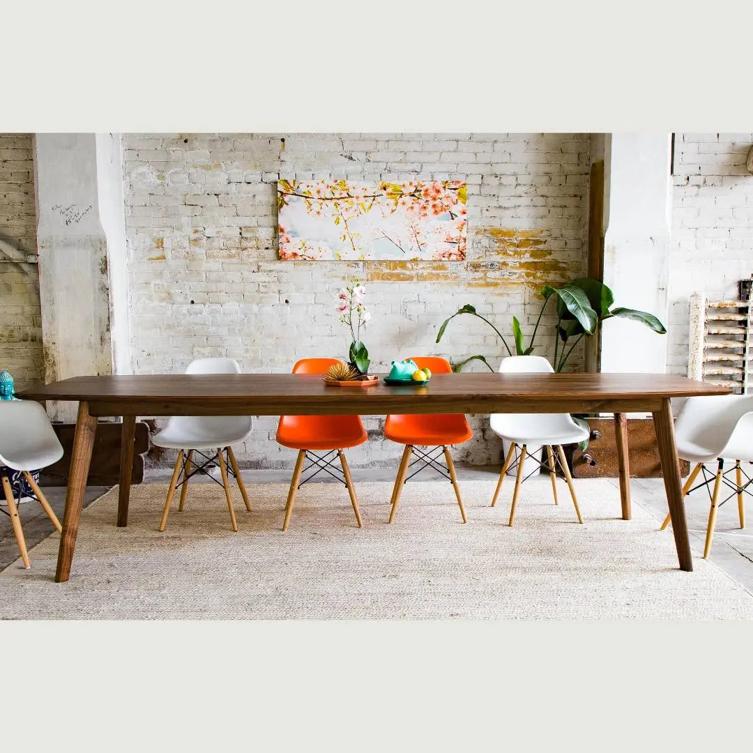Detailed shot of wood grain, showcasing quality of Scandinavian dining table design