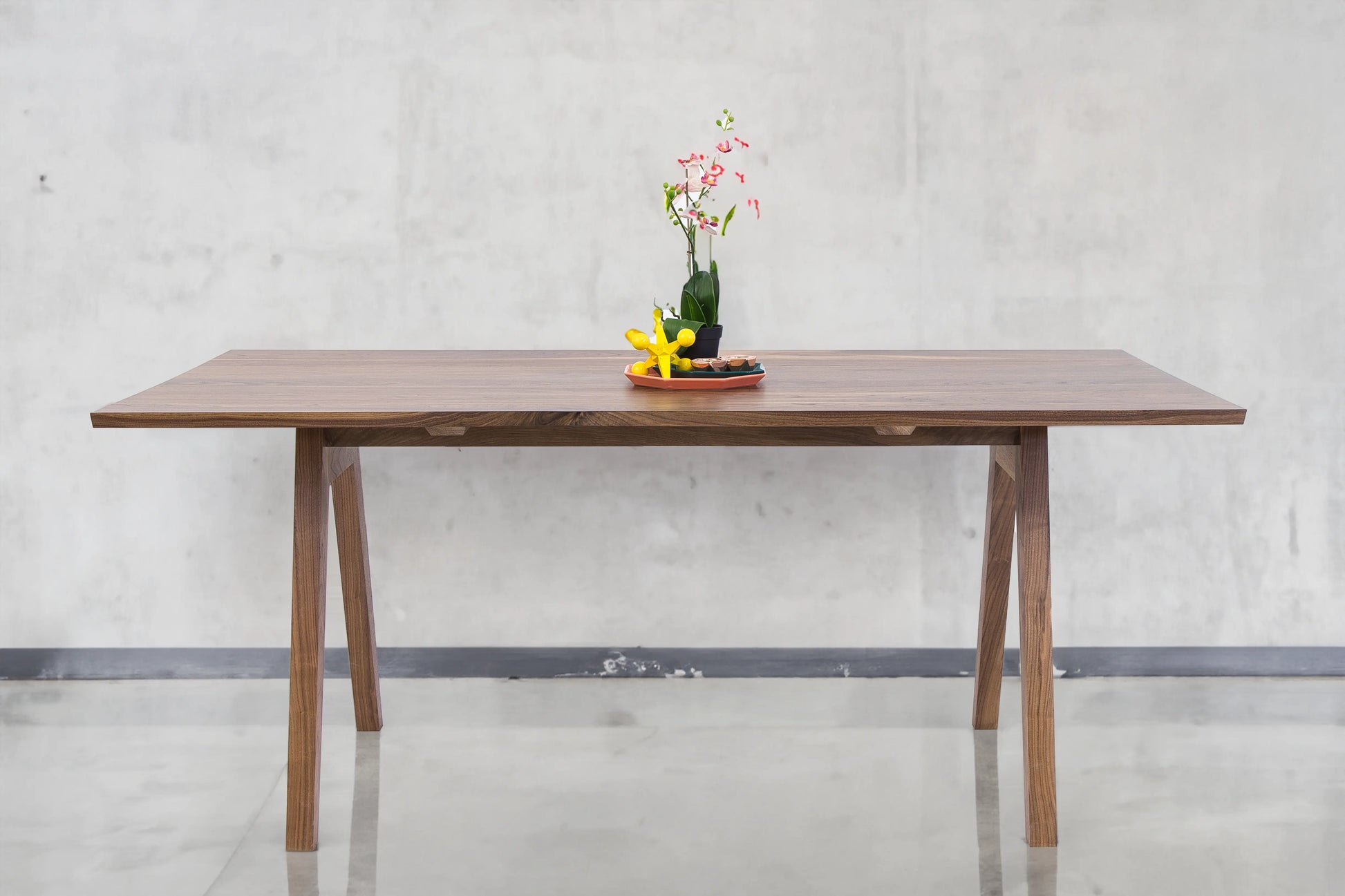 Overhead view of the Sputnik table highlighting its Danish Modern craftsmanship