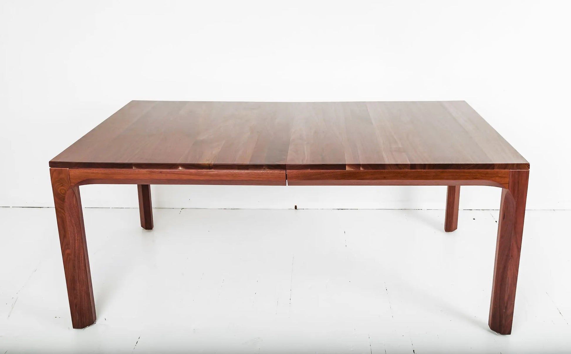 Custom walnut dining table for sustainable and modern home decor
