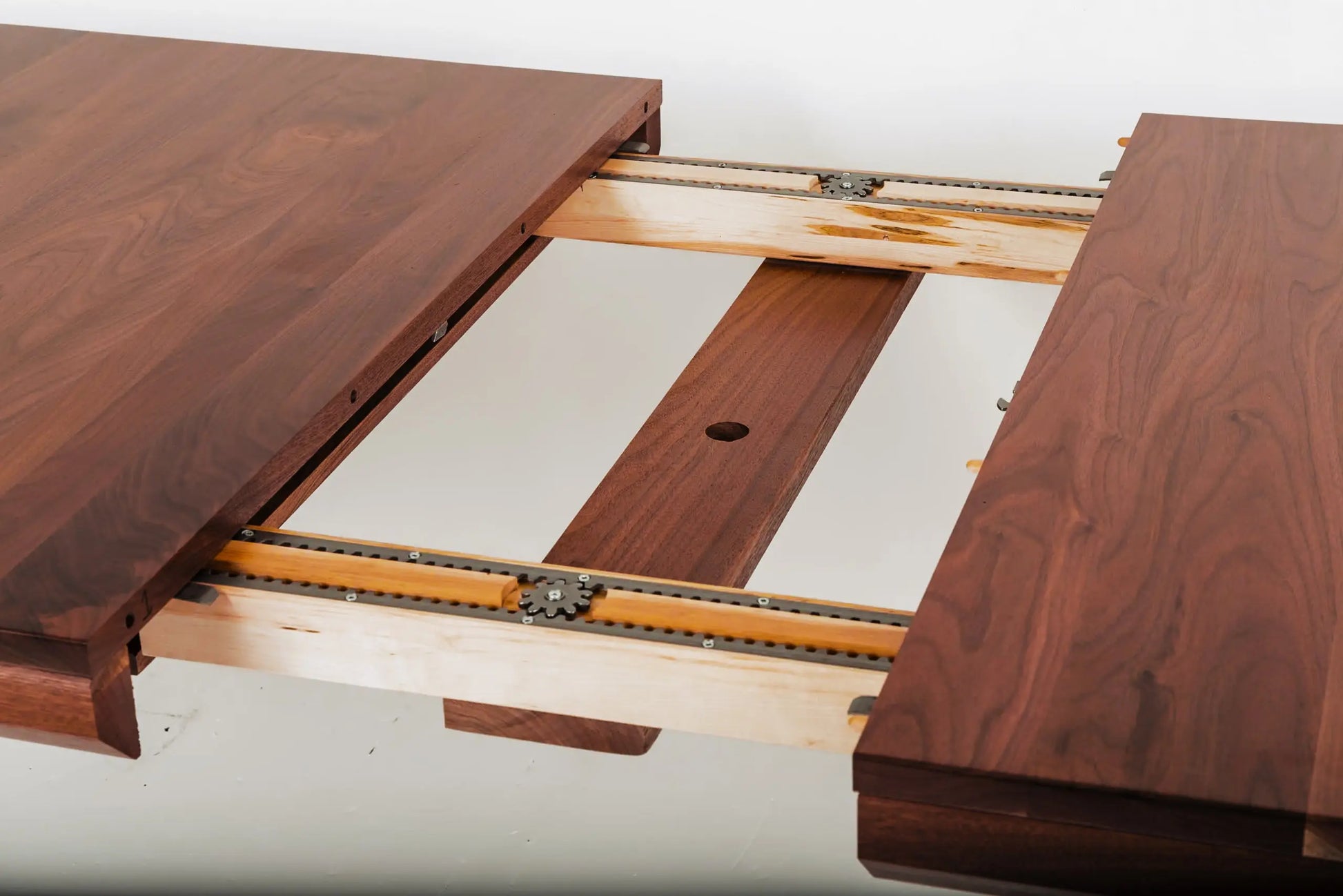 Scandinavian-inspired dining table setup with walnut and bright accents
