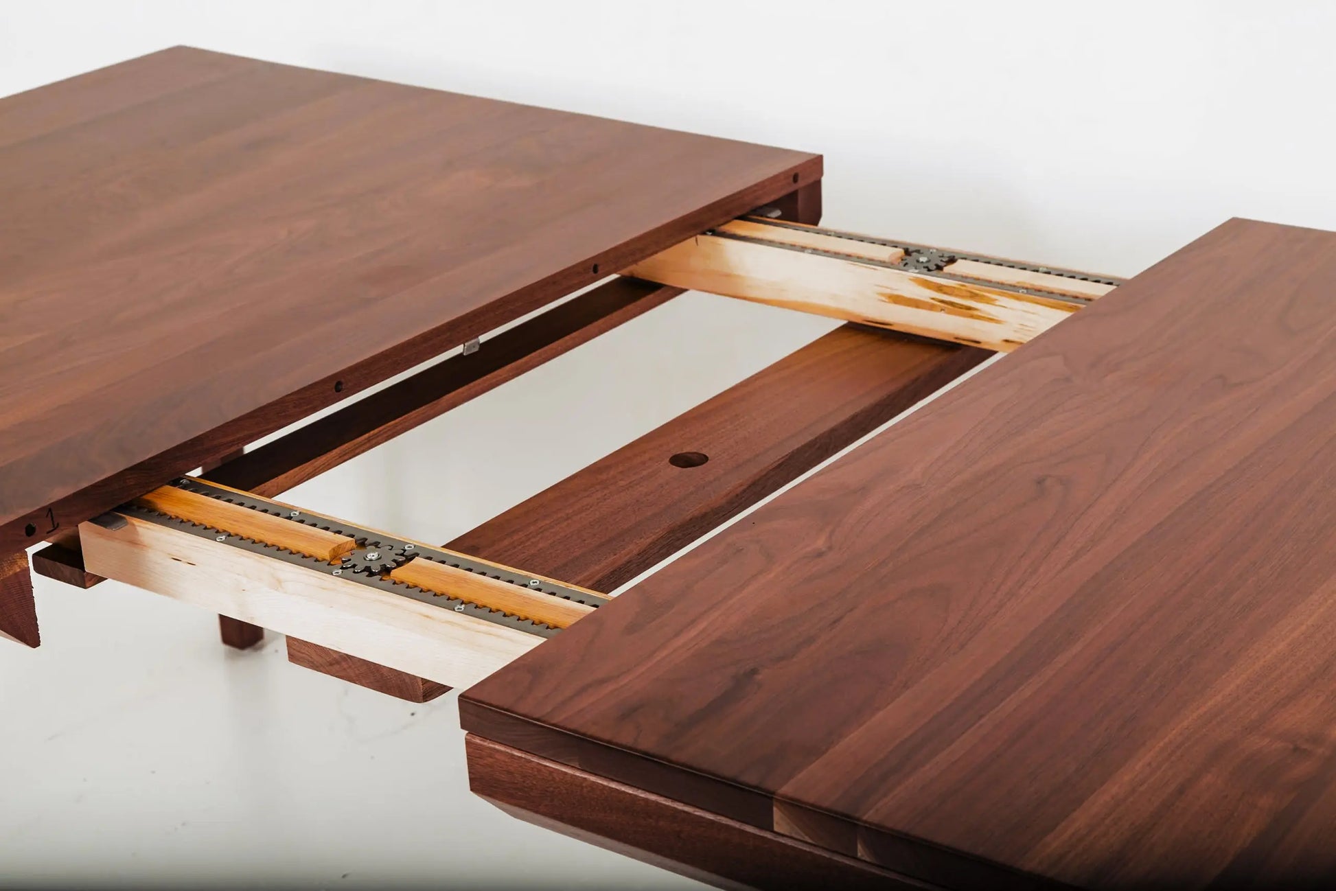 Modern walnut dining table with a bench, perfect for Japandi aesthetics
