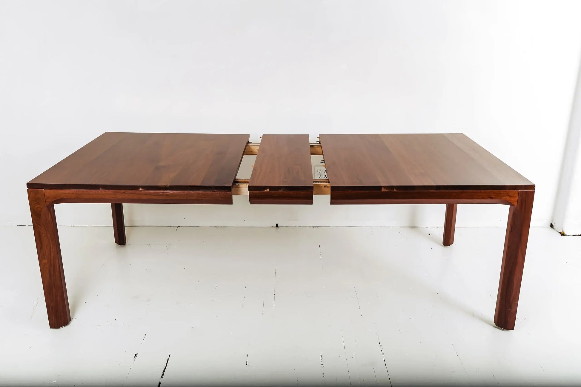 Walnut dining table with bench seating for an airy, Scandinavian look
