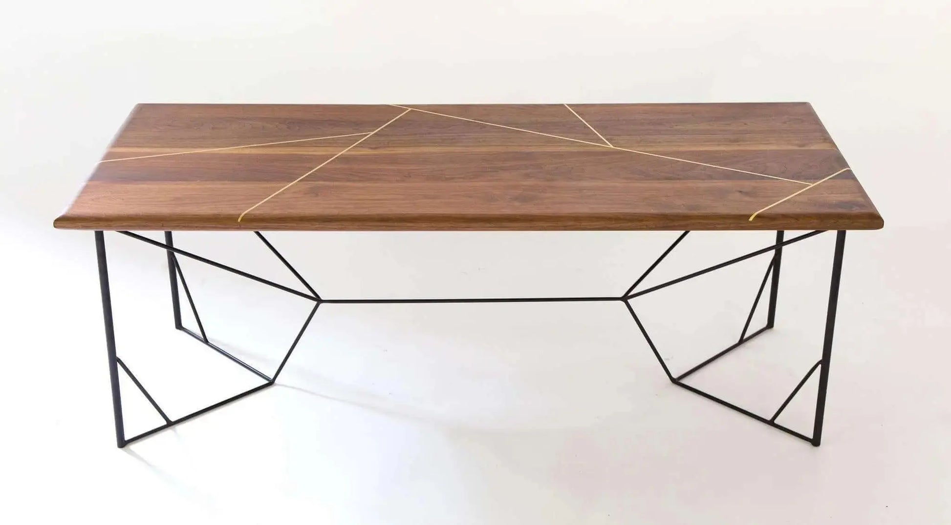 Designer walnut coffee table with soft, rounded edges