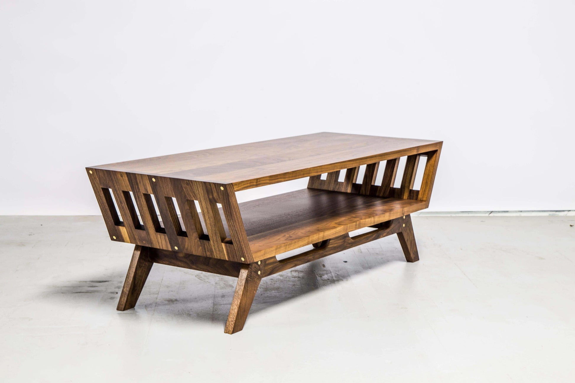 Stylish mid-century coffee table with a rich walnut finish