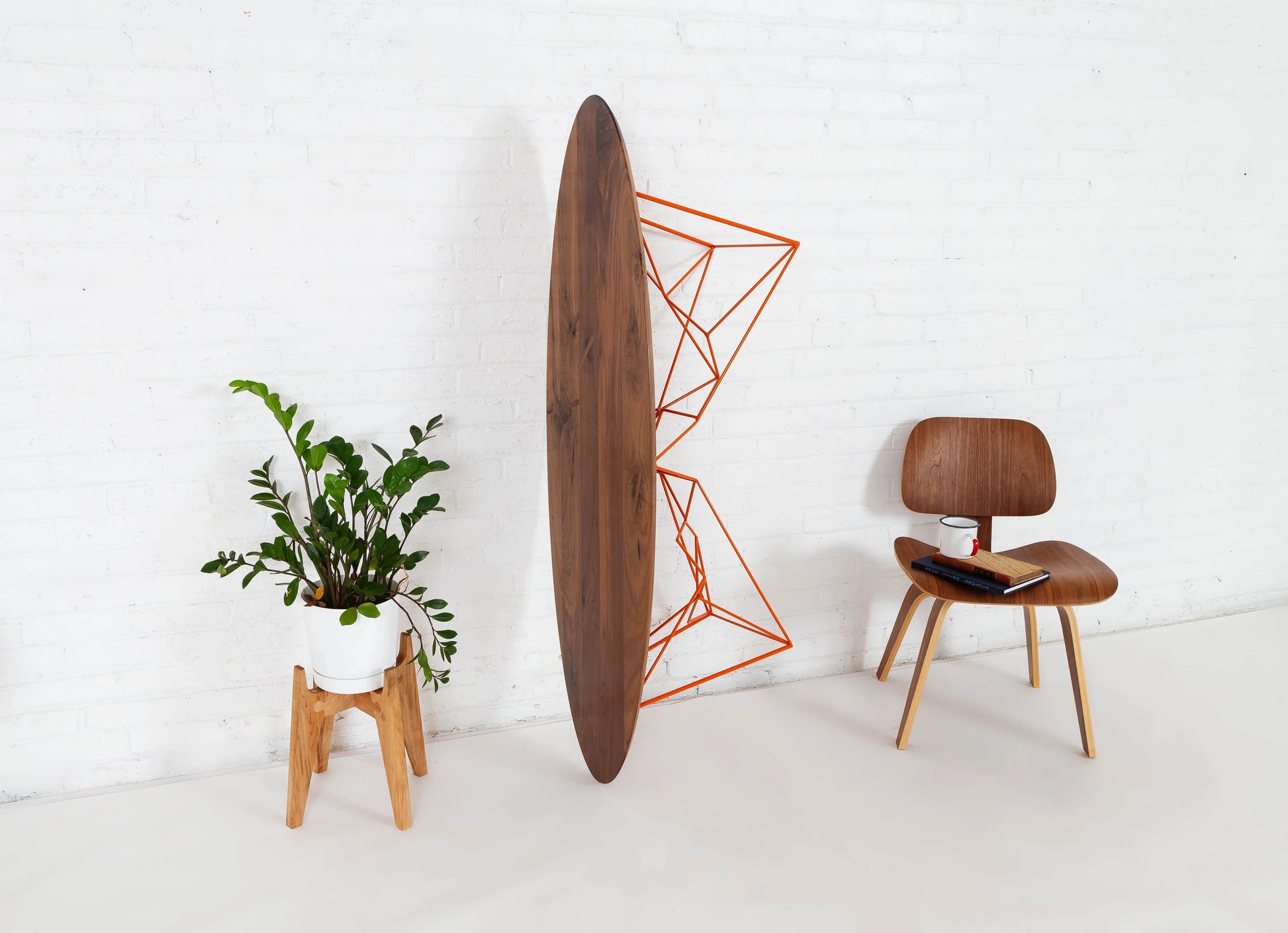 Modern mid-century surfboard coffee table with warm walnut tones