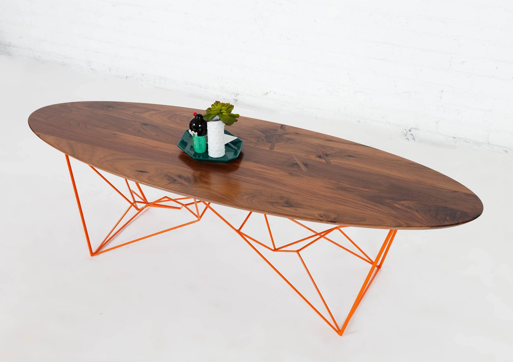 Stylish surfboard coffee table with clean lines and warm tones