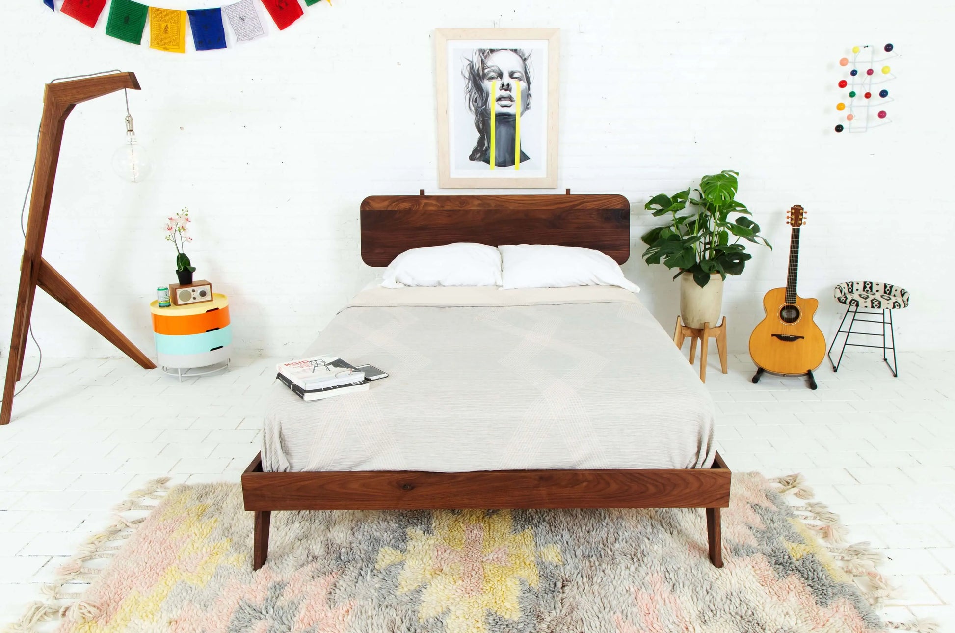 Modern walnut floor lamp with a soft white fabric shade