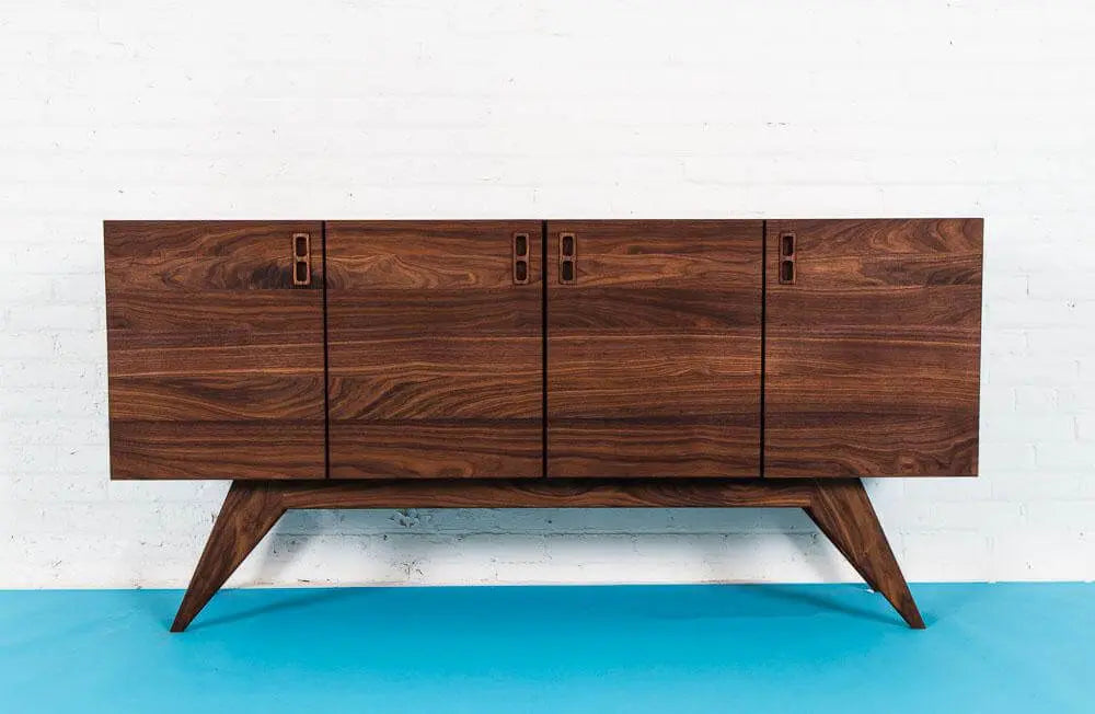 A Walnut Mid Century Modern Credenza, Blue floor with White Background. 
