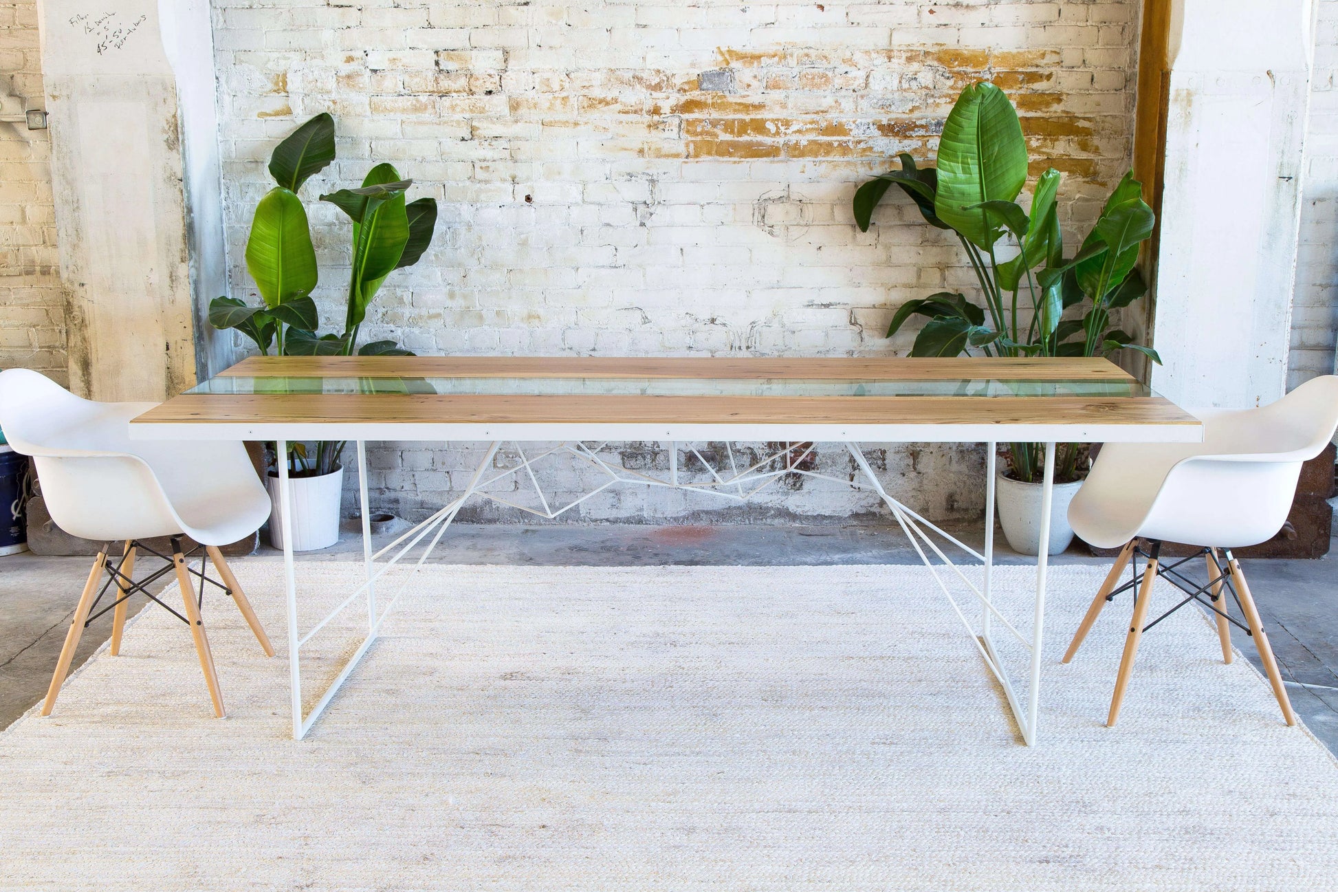 Solid walnut live edge dining table with a minimalist mid-century design