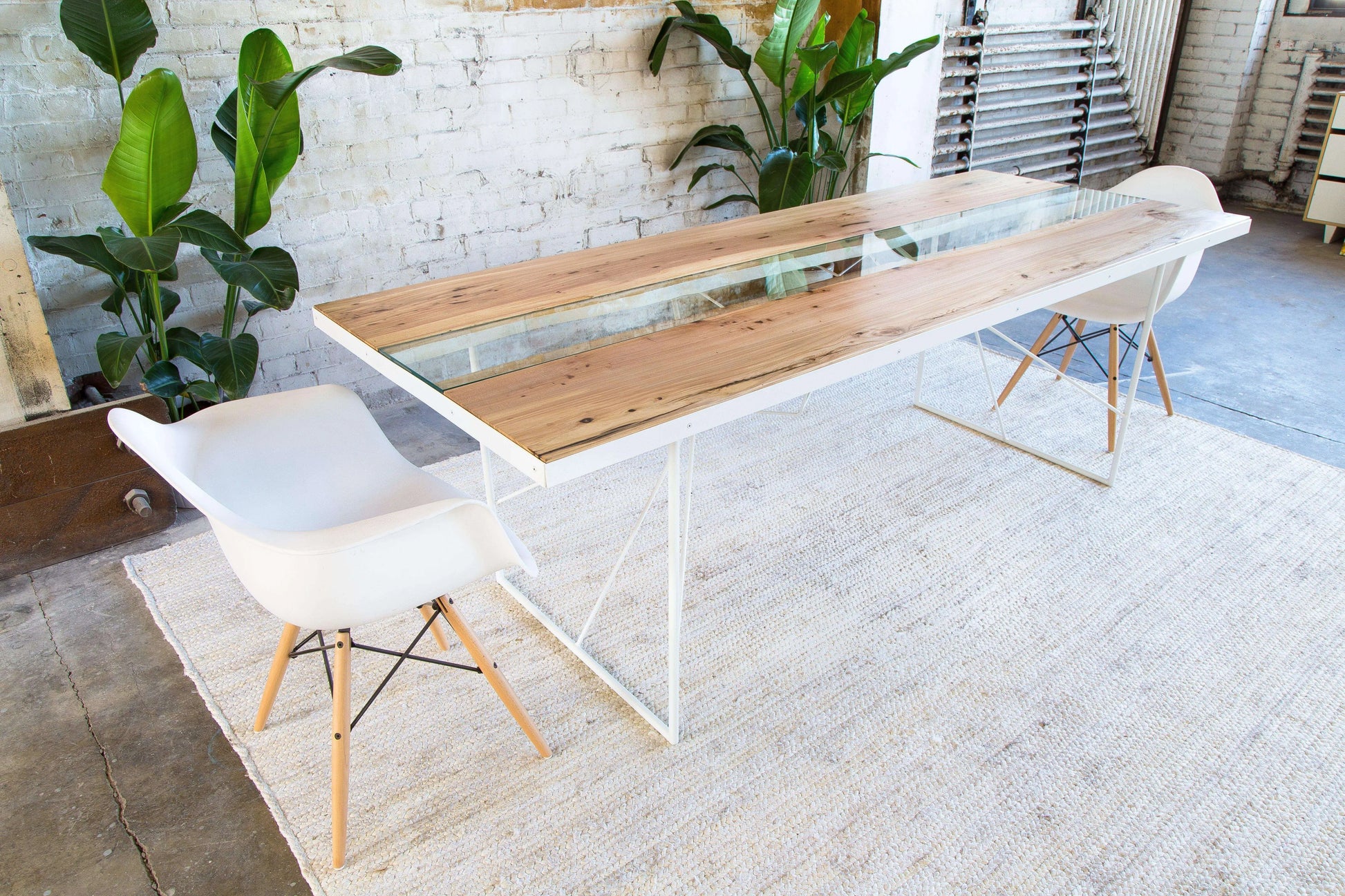 Mid-century modern dining table with a live edge wood tabletop