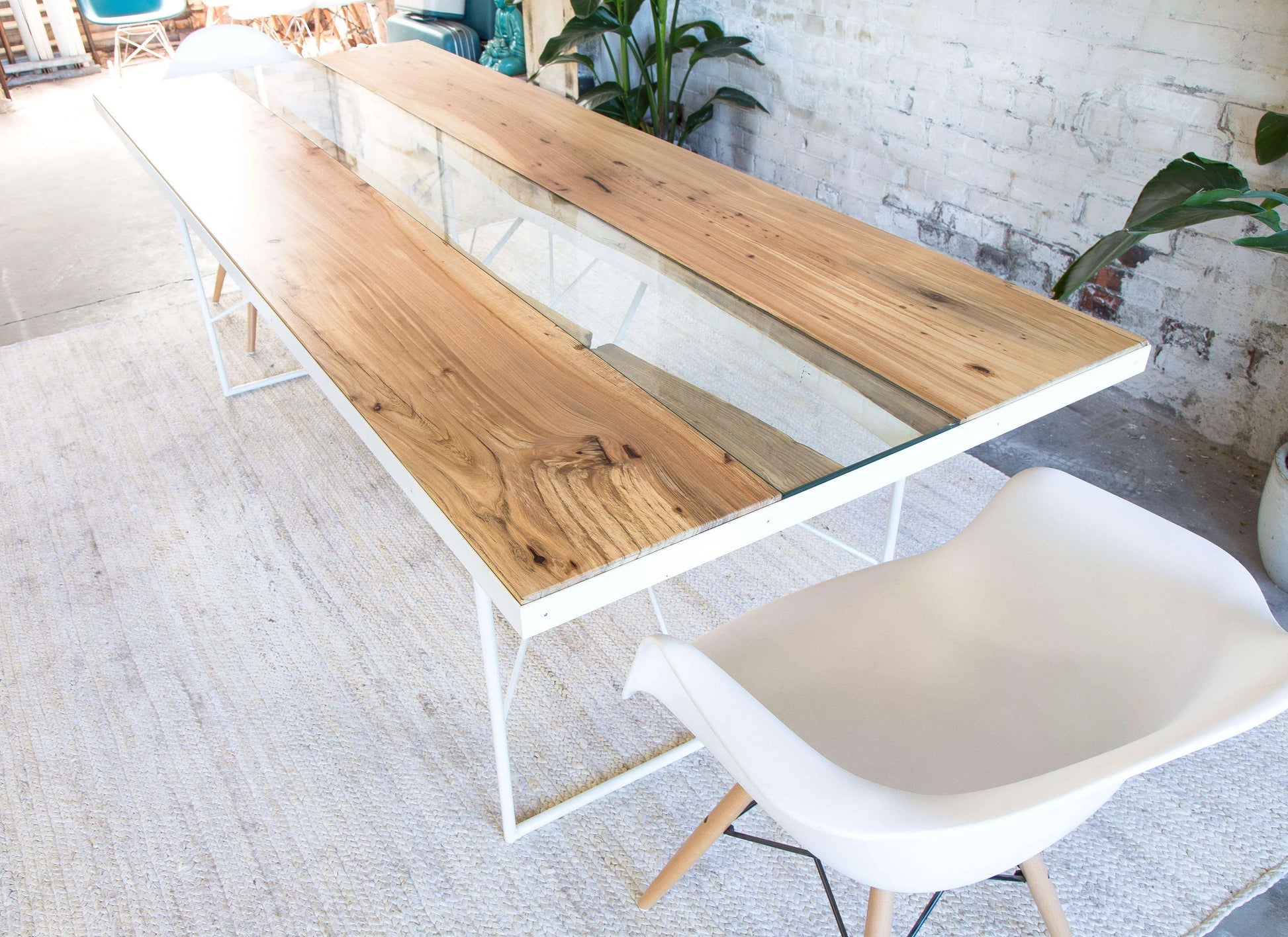 Unique live edge wood dining table with warm mid-century tones