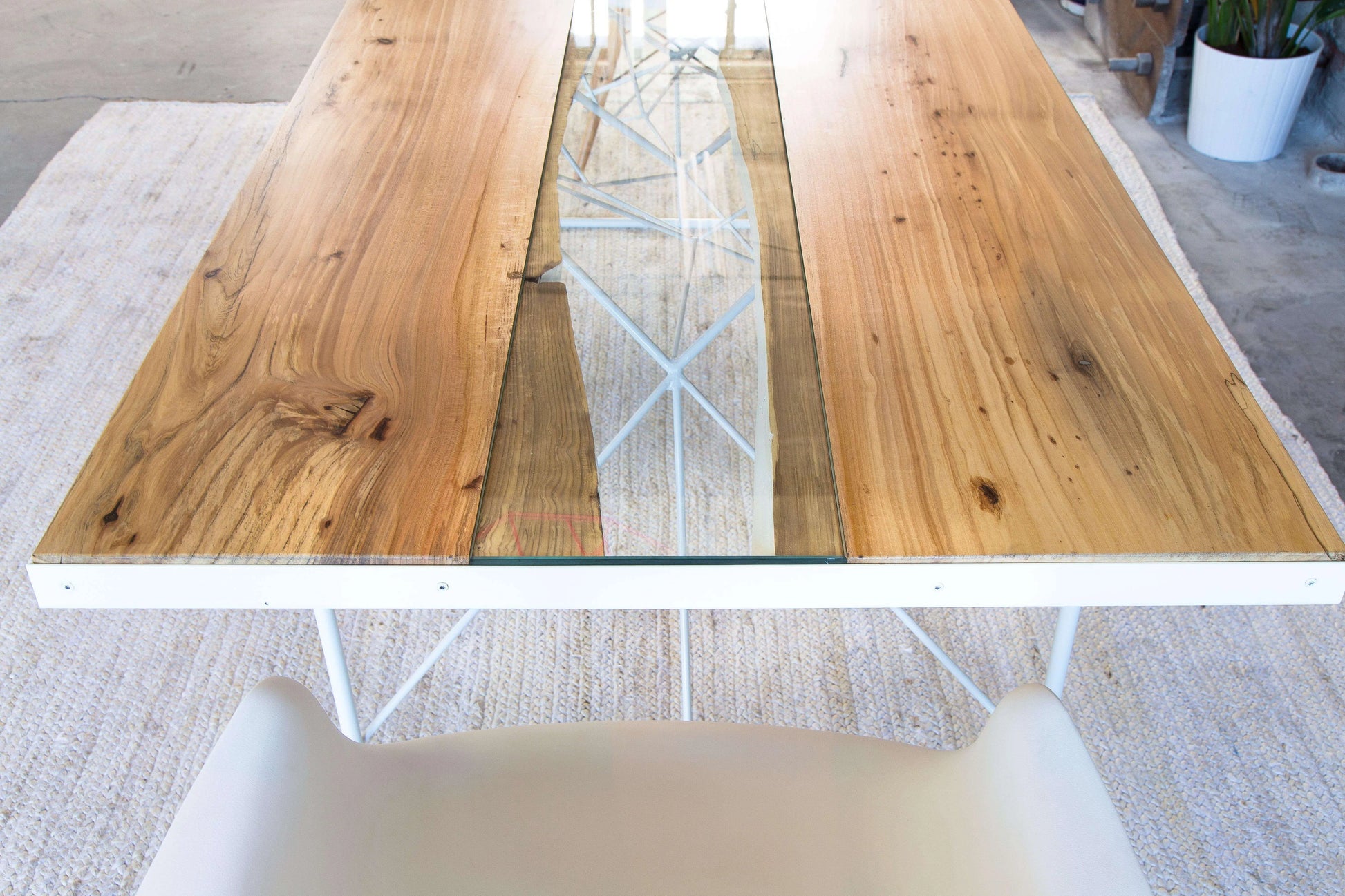 Elegant mid-century dining table with handcrafted live edge details