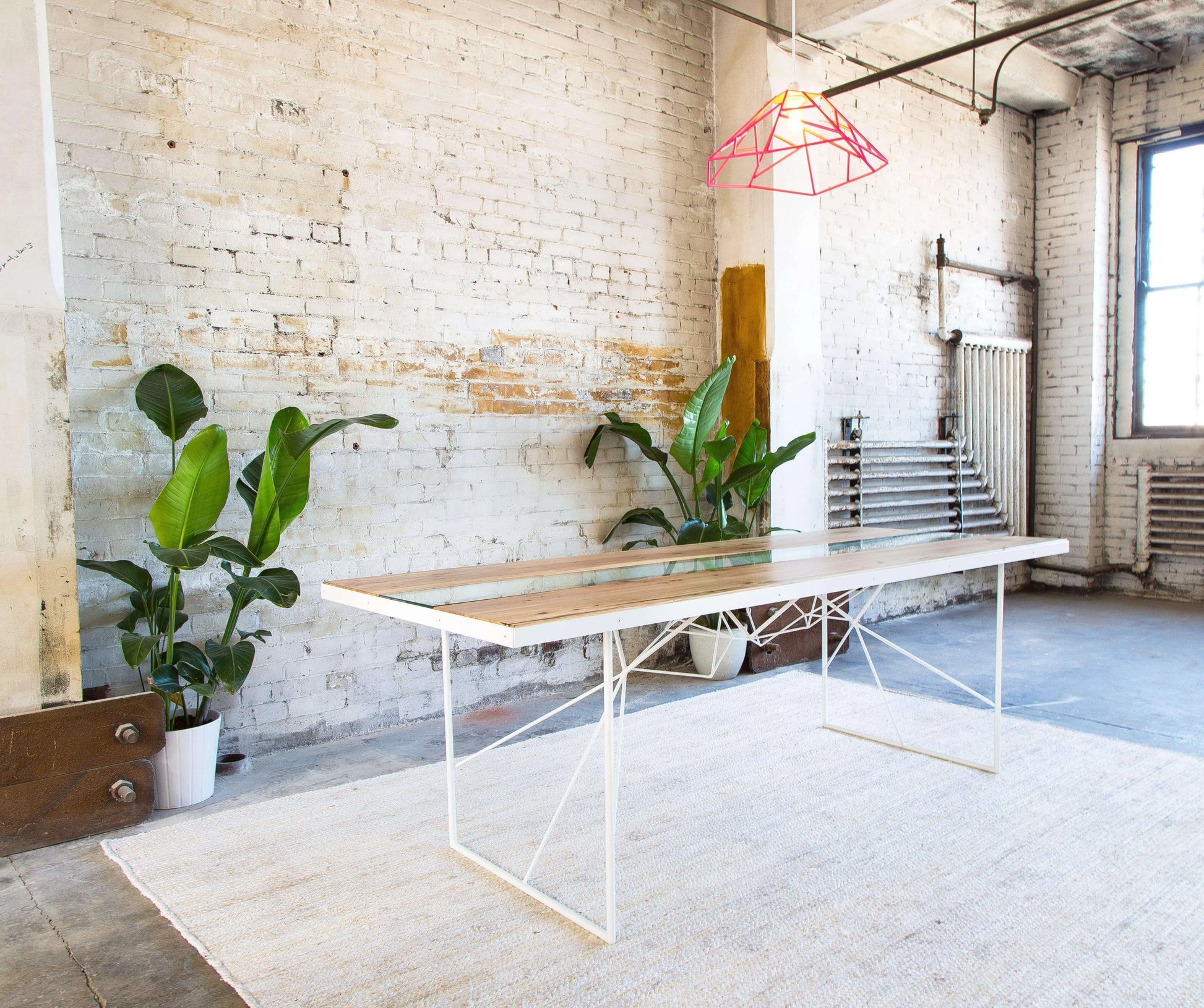 Mid-century inspired dining table with a sleek live edge wood top
