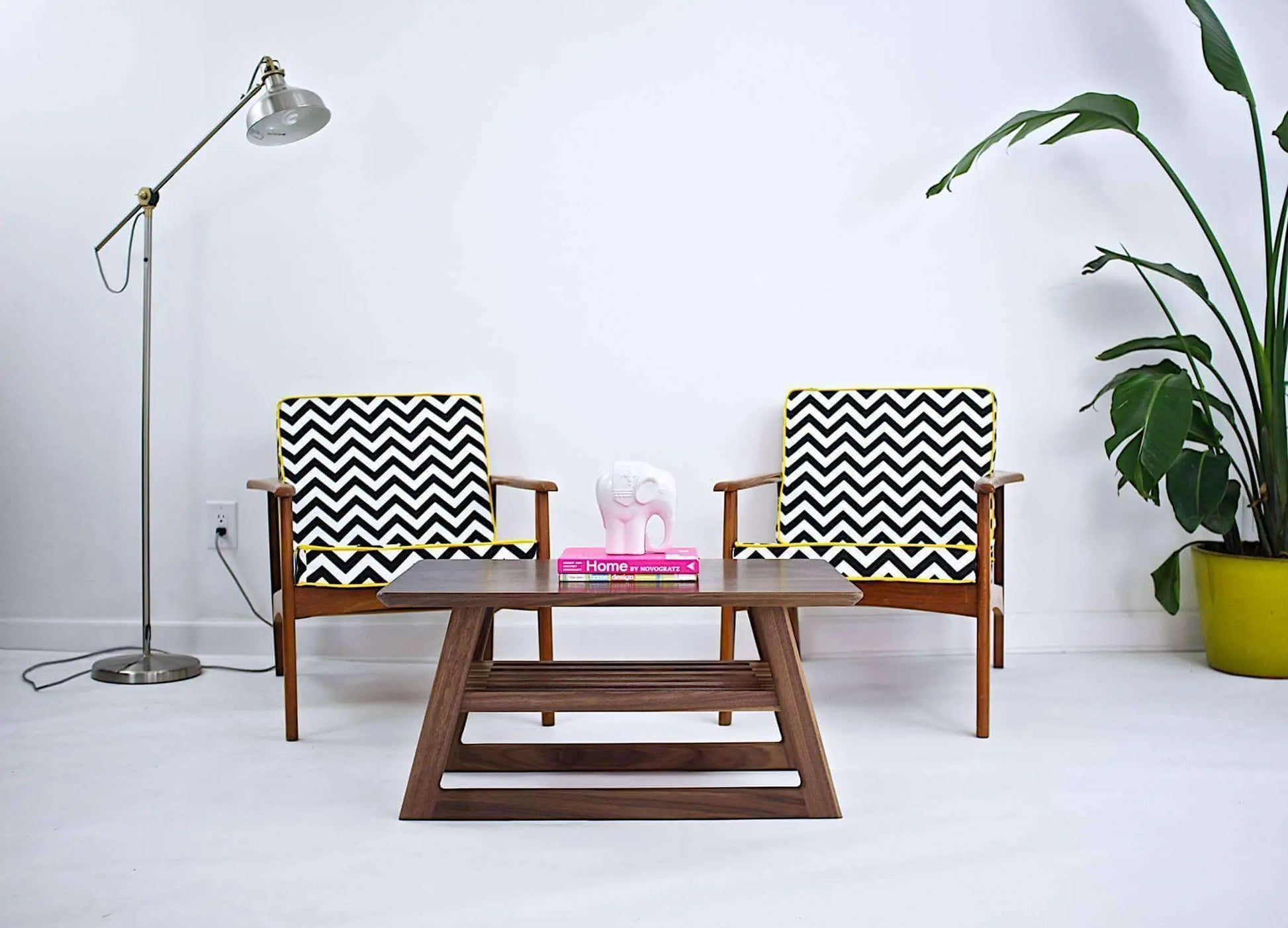 "The Clevelander" Mid Century Modern Coffee Table displayed in a luxury living room, exemplifying high-end mid-century modern living room furniture.