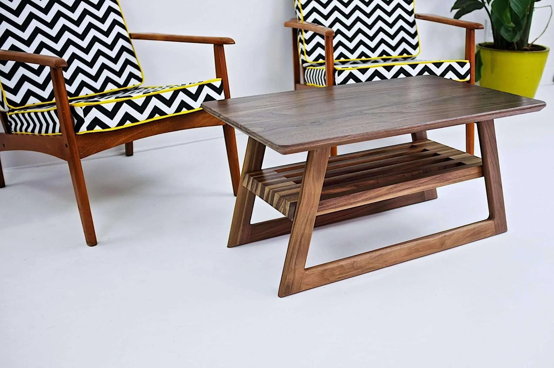 "The Clevelander" coffee table as part of a sophisticated interior, showing the appeal of mid-century modern furniture in modern homes.