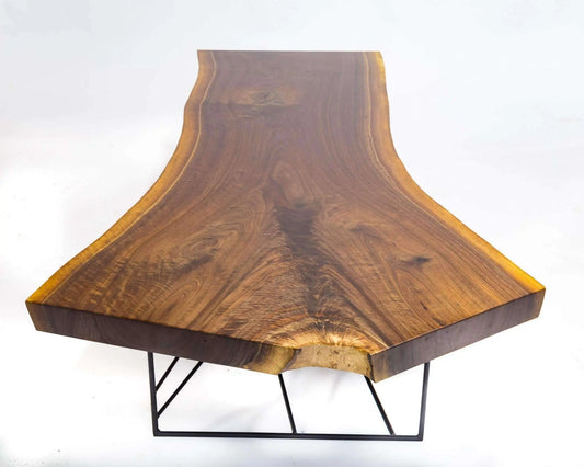 Live edge walnut dining table with minimalist modern legs