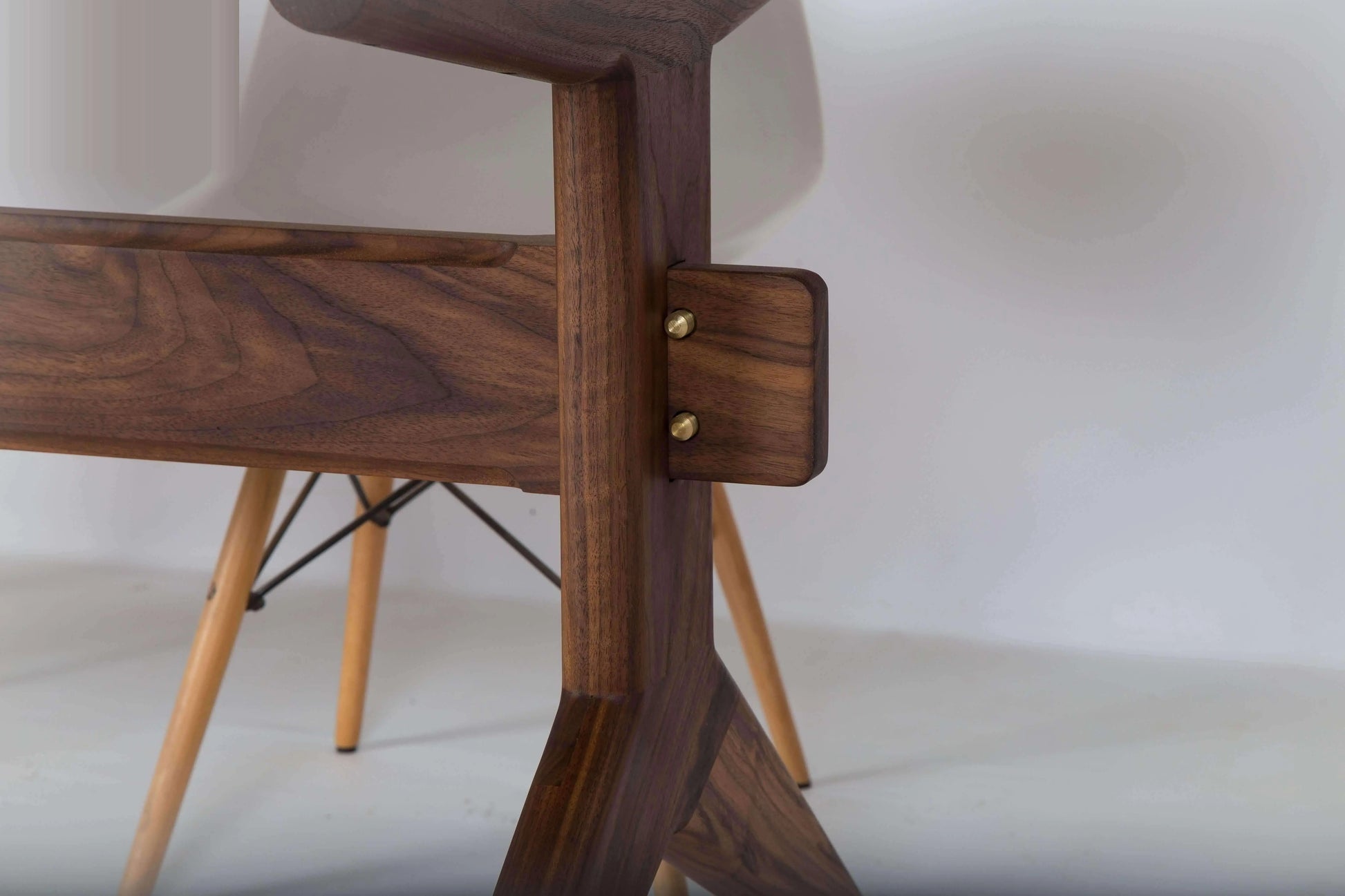 Elegant mid-century walnut dining table with tapered legs
