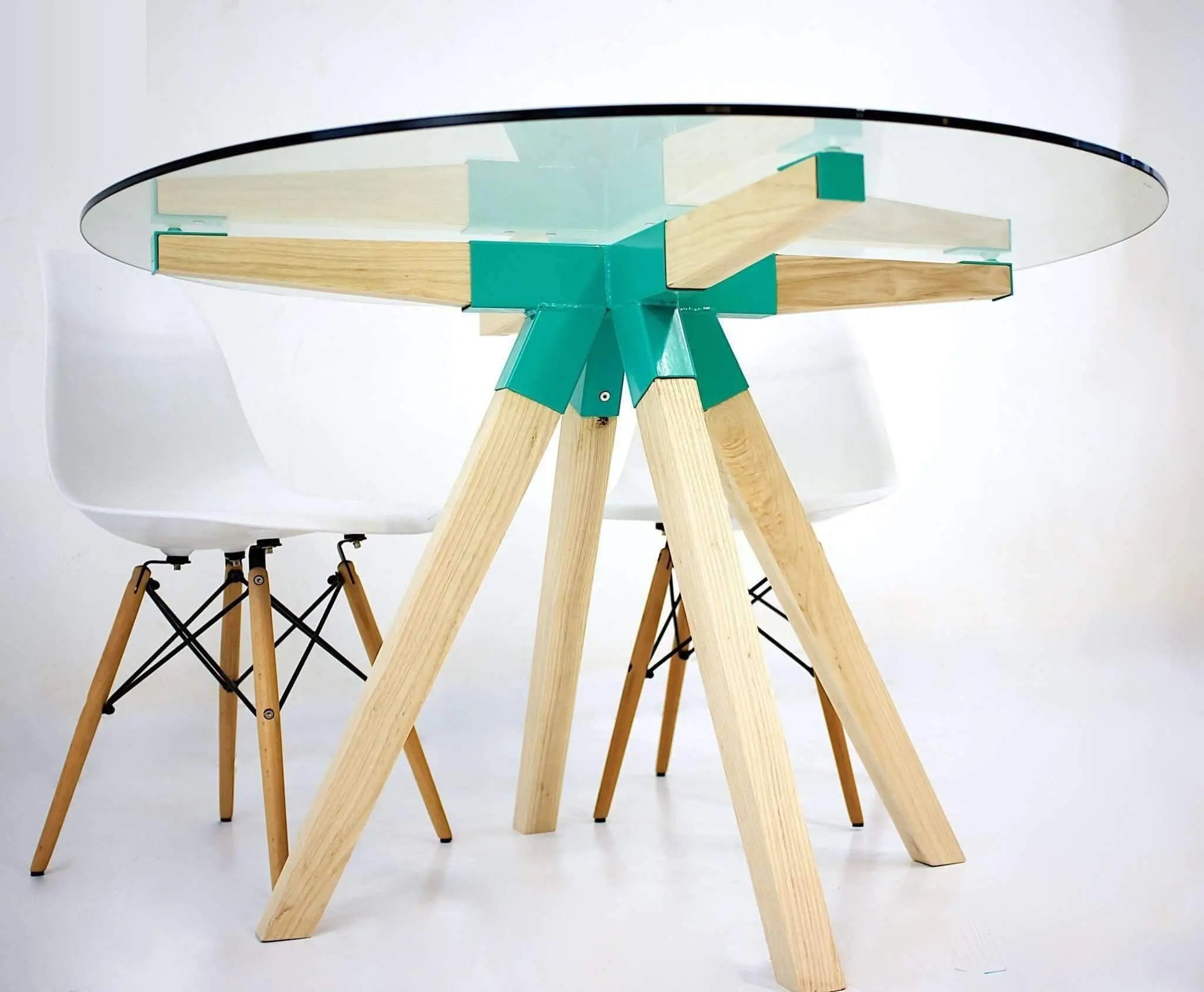 Scandinavian-inspired glass dining table with clean mid-century lines