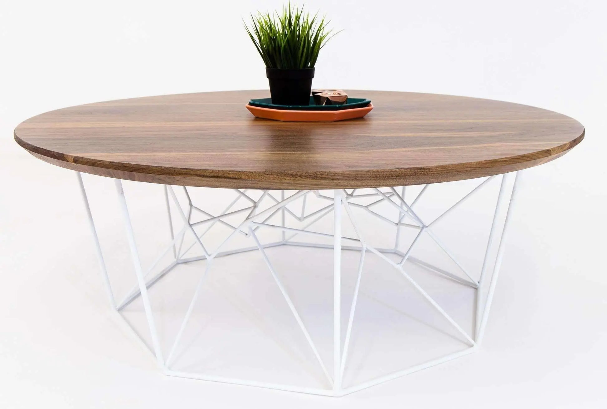 Minimalist walnut round coffee table with vintage mid-century appeal