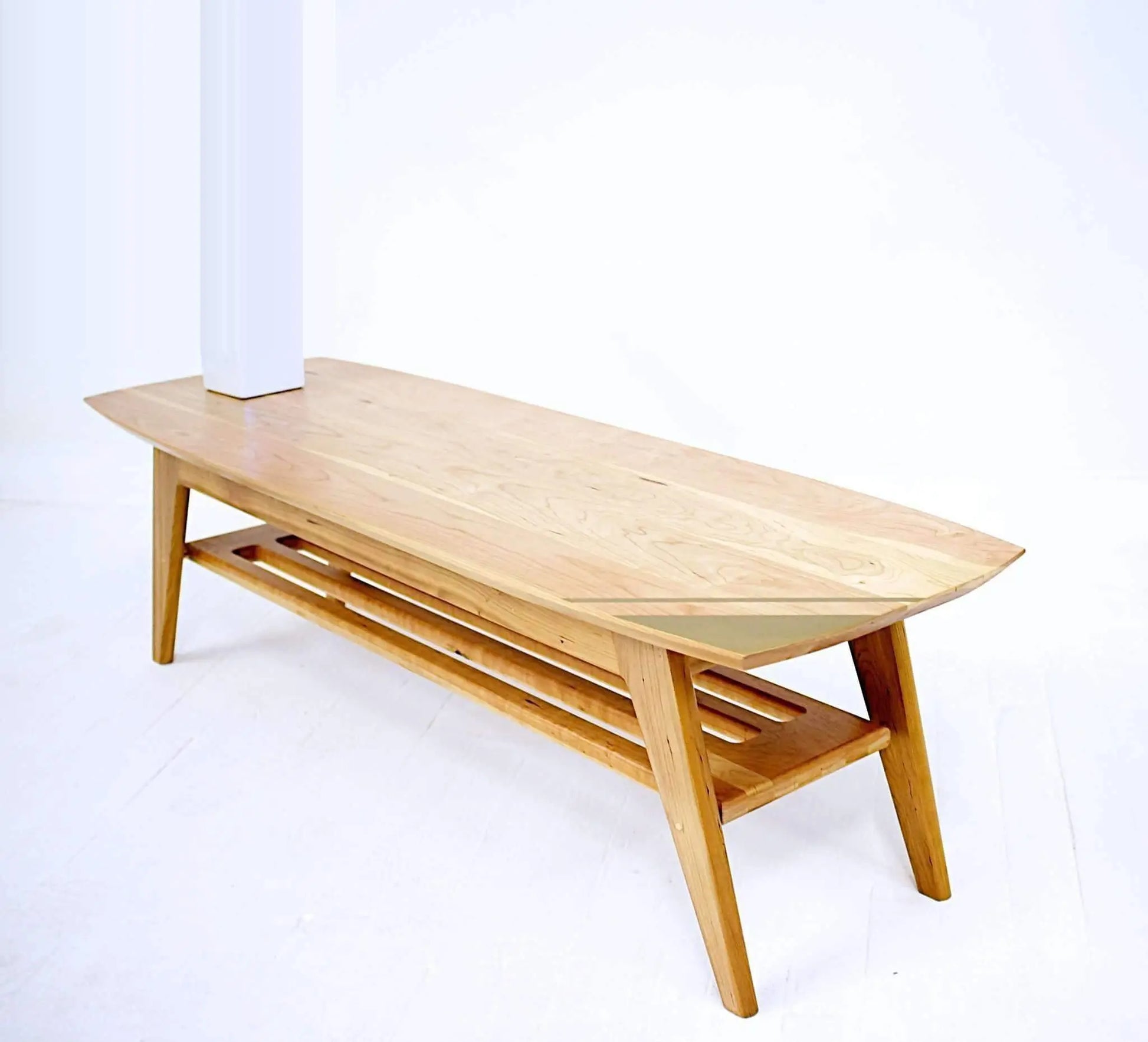 Stylish living room coffee table with an iconic surfboard shape