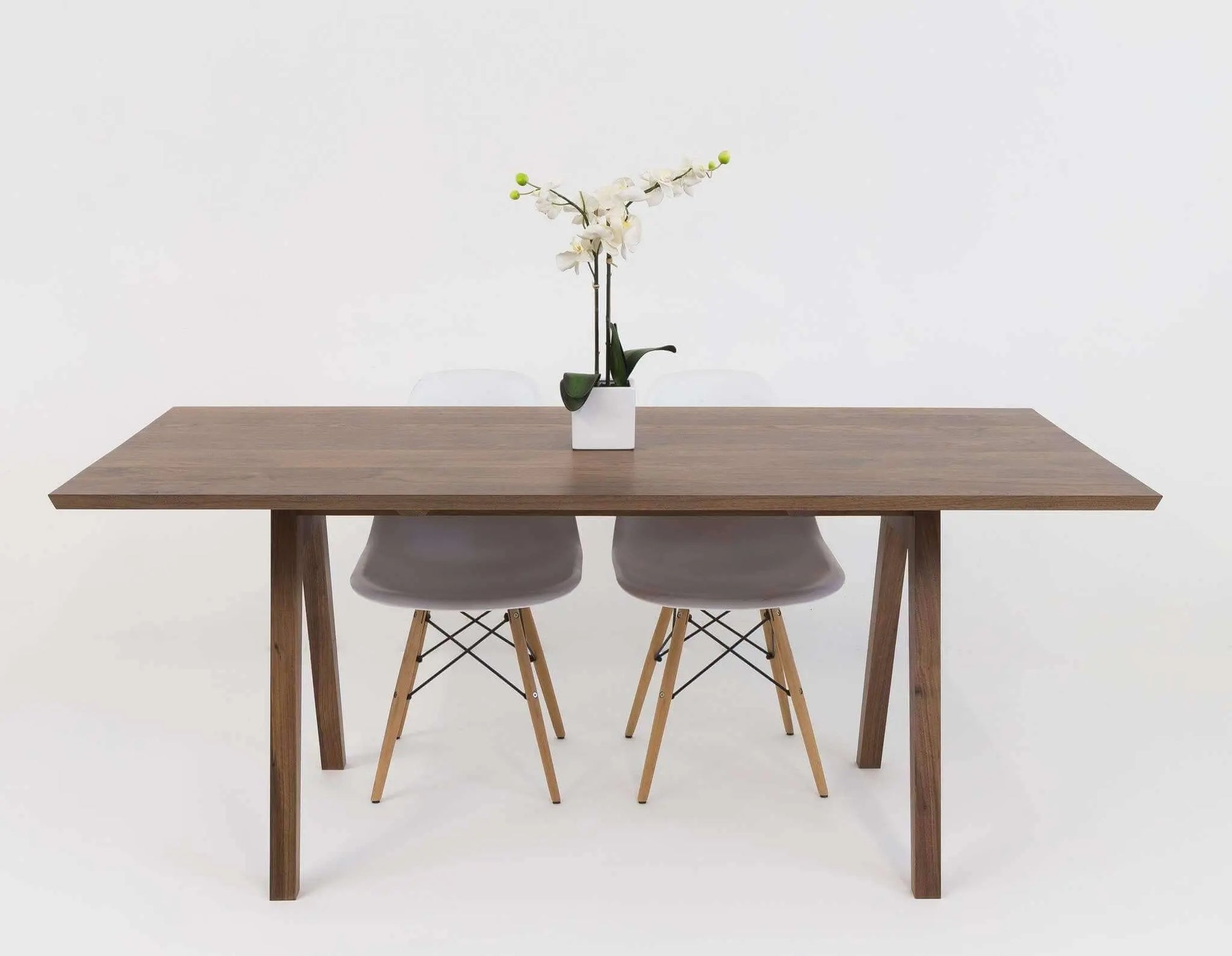 Close-up view of the Sputnik table's exquisite hardwood