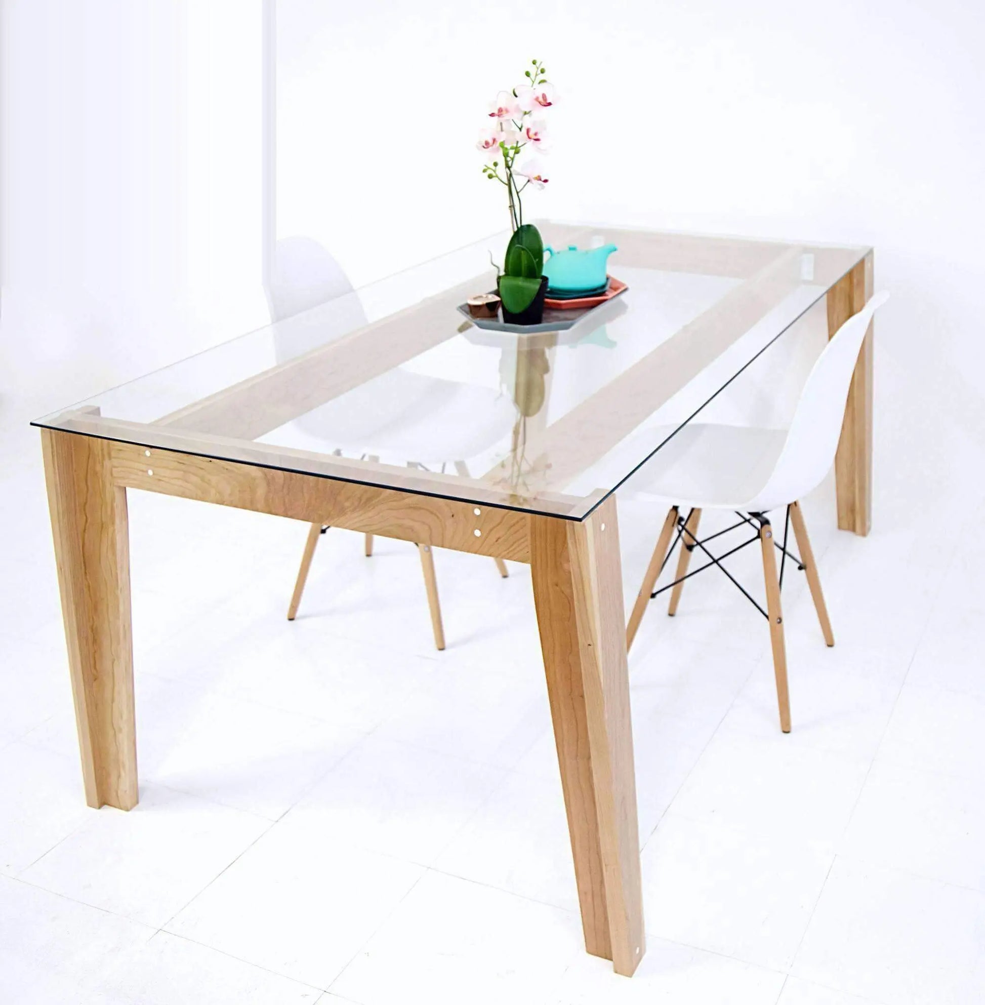 Spacious mid-century dining table with thick tempered glass