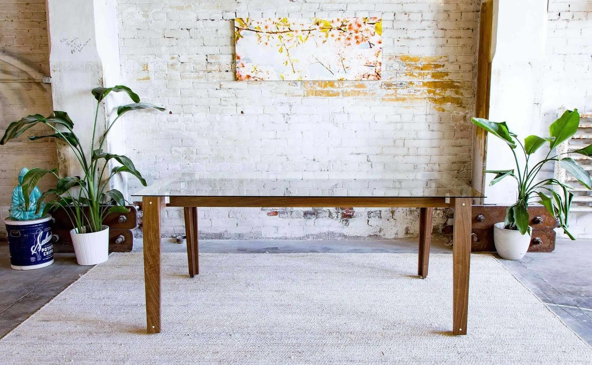 Functional tempered glass dining table with a retro aesthetic