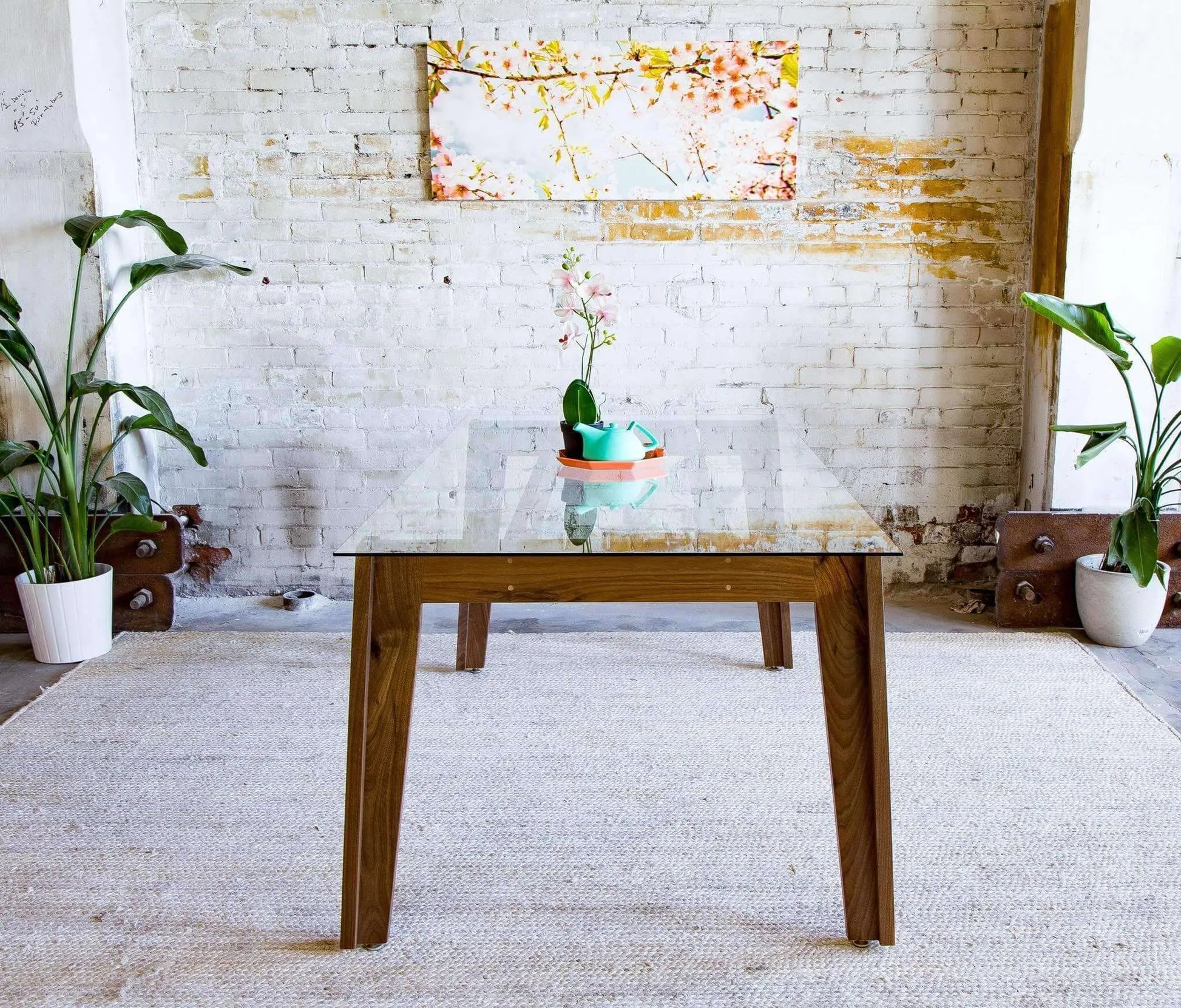Luxury tempered glass-top dining table with a Scandinavian touch