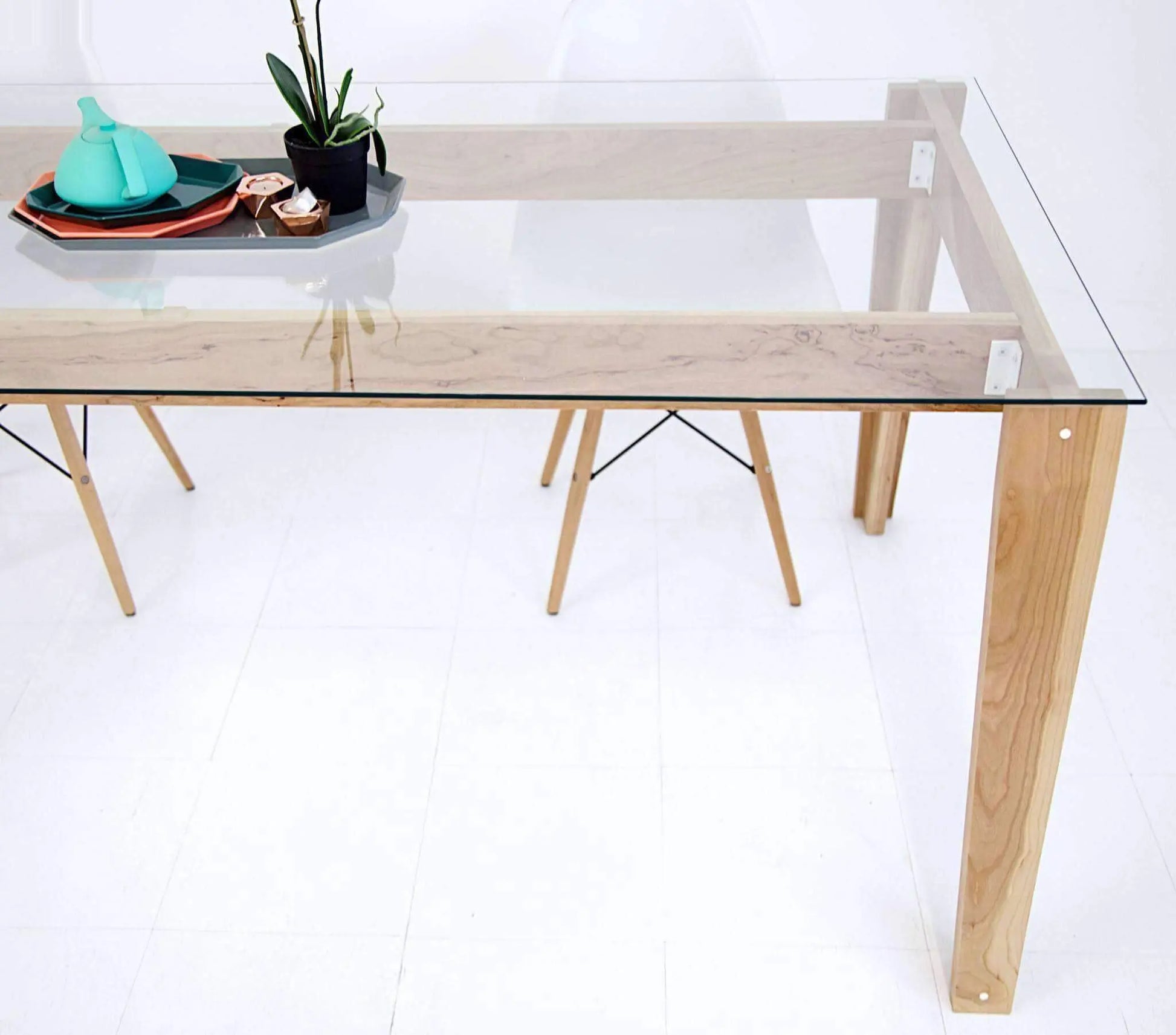 Functional tempered glass dining table with spacious surface area
