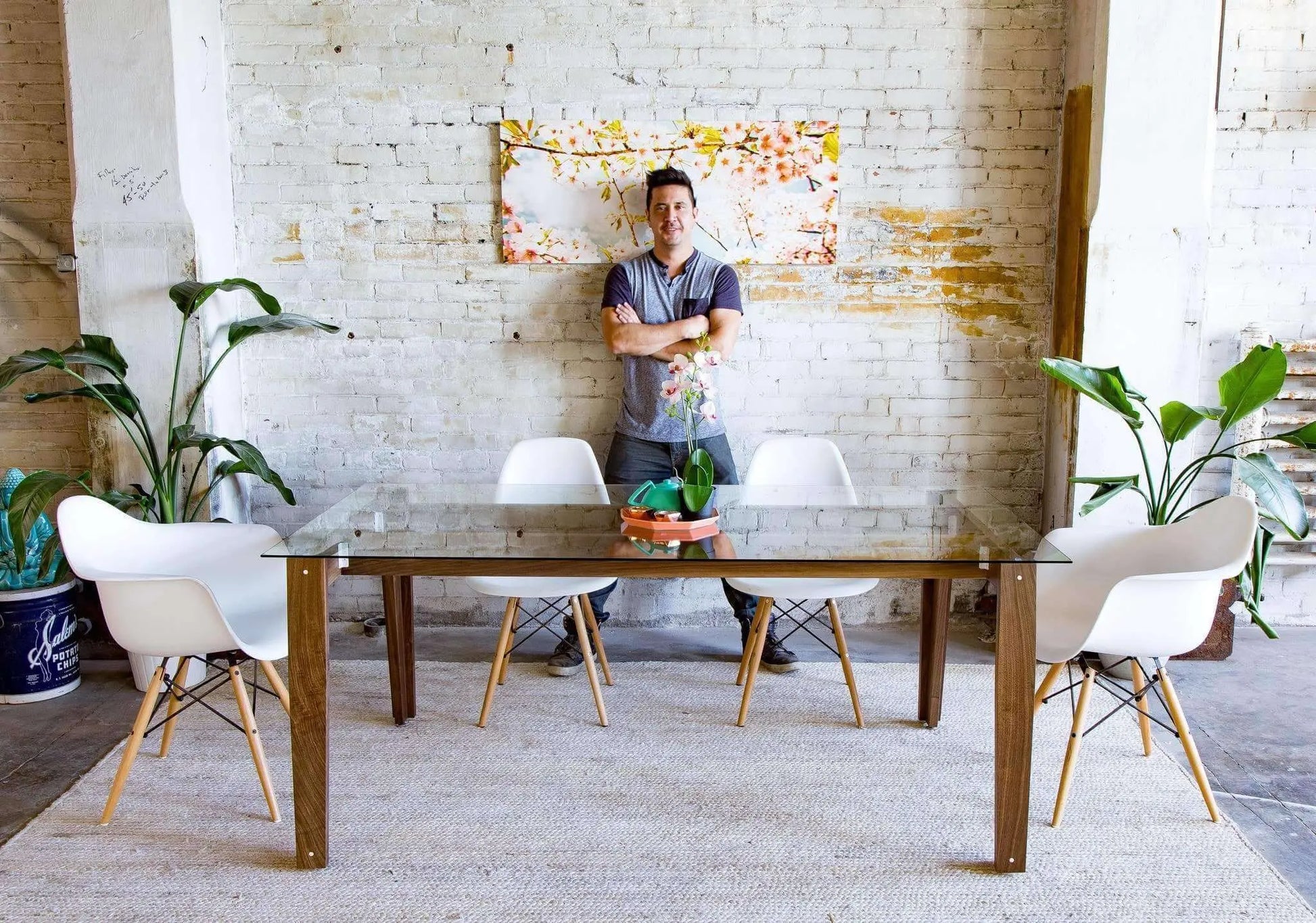 Contemporary mid-century glass dining table for modern interiors