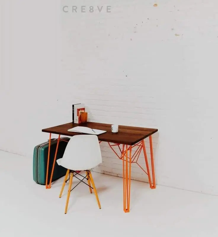 Compact Danish modern writing desk with stylish mid-century legs