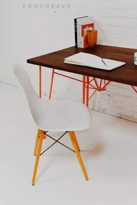 Sleek mid-century modern office desk with a Danish-style frame