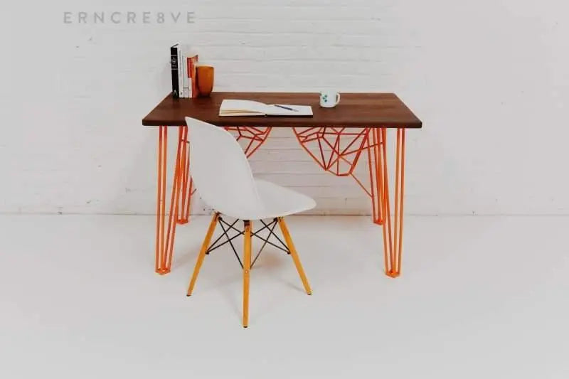 Solid wood Danish modern writing desk with a mid-century profile