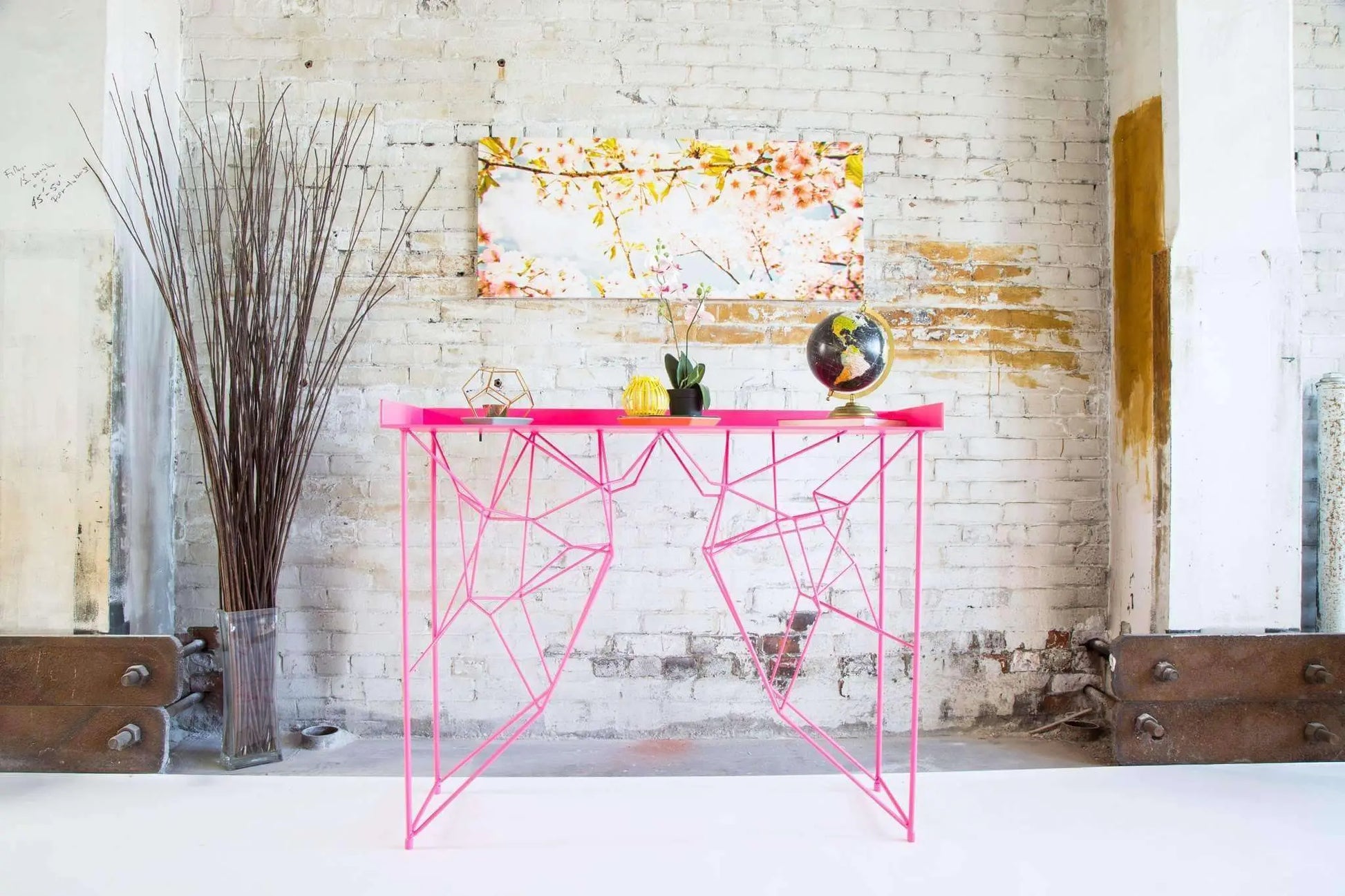 Luxury pink hallway console table with a timeless mid-century look