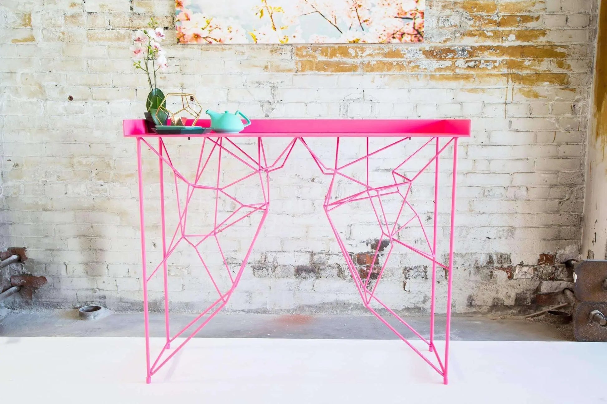 Modern mid-century pink console table for elegant interiors