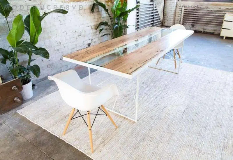 Natural live edge dining table with sleek mid-century wooden legs