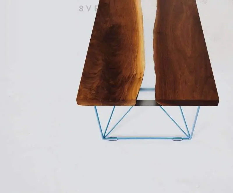 Luxury live edge walnut dining table with a durable resin overlay