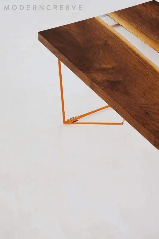 Live edge walnut resin dining table with a stunning organic design