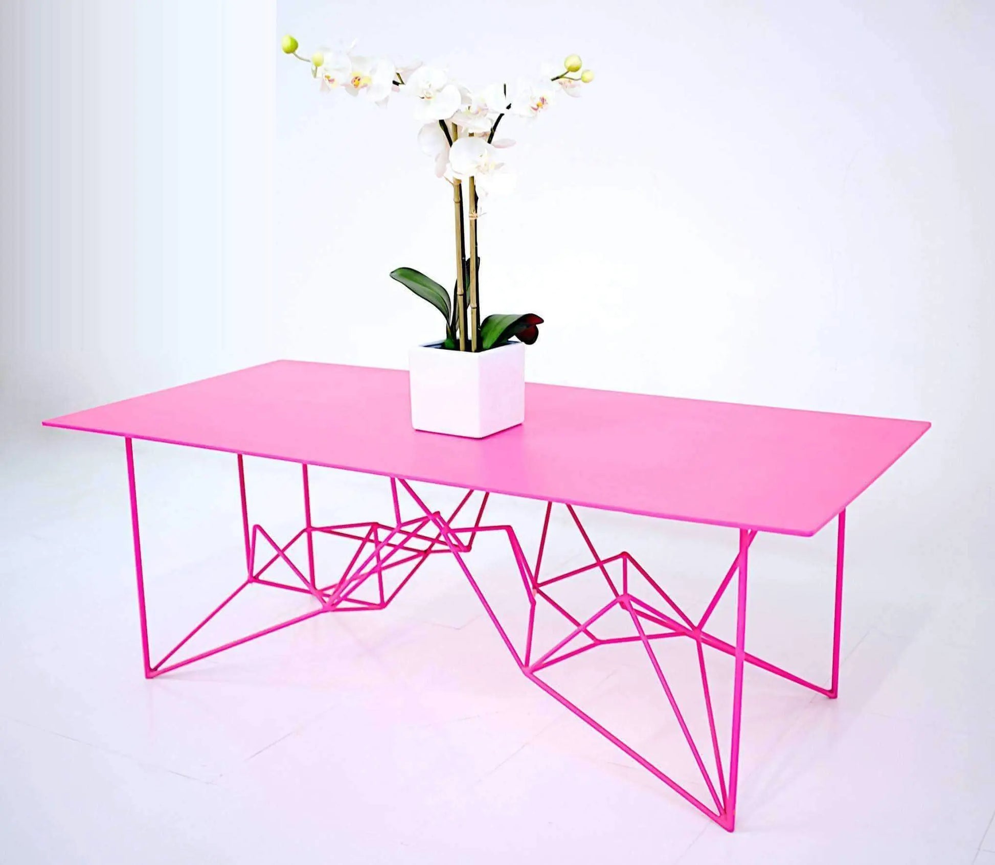 Luxury steel console table with a blush pink finish and modern appeal